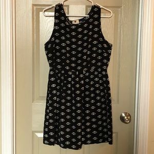 Cute black and white dress with cutout back. NWOT